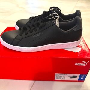 Brand new never warn Puma sneakers for men size 9 Black and white